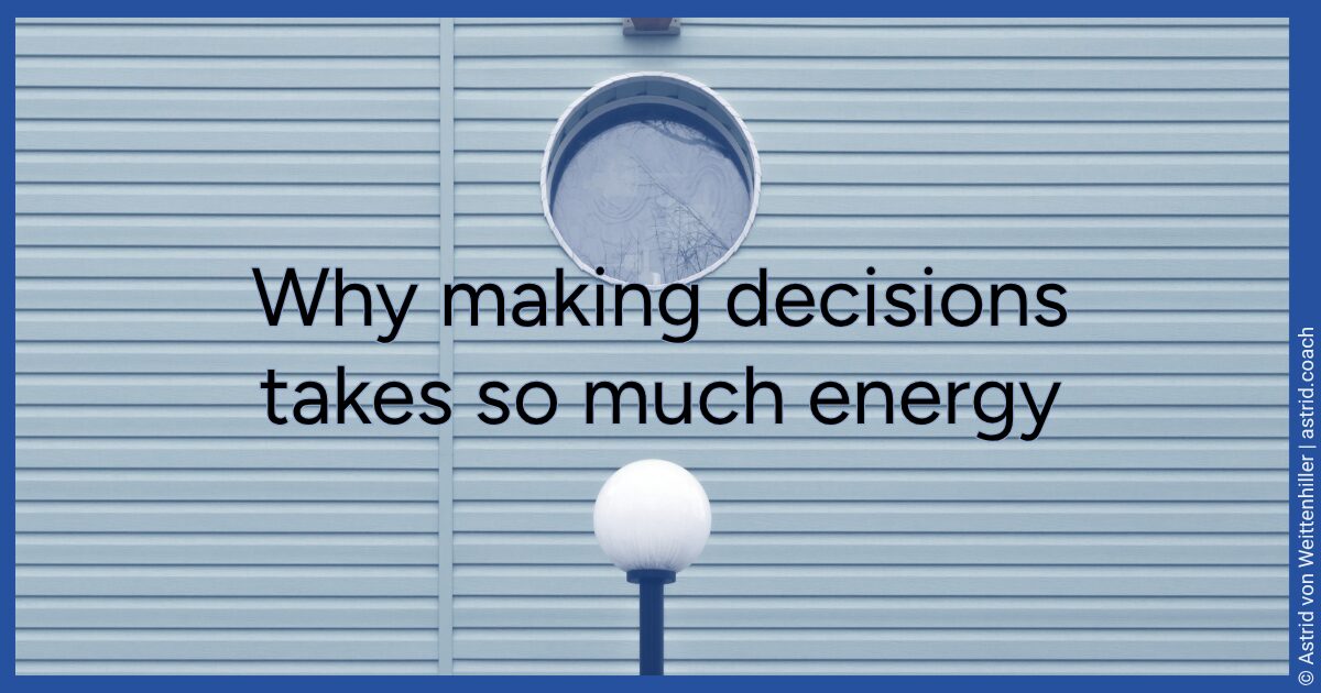 Facade of a building with horizontal ridges and a round window in shades of blue.