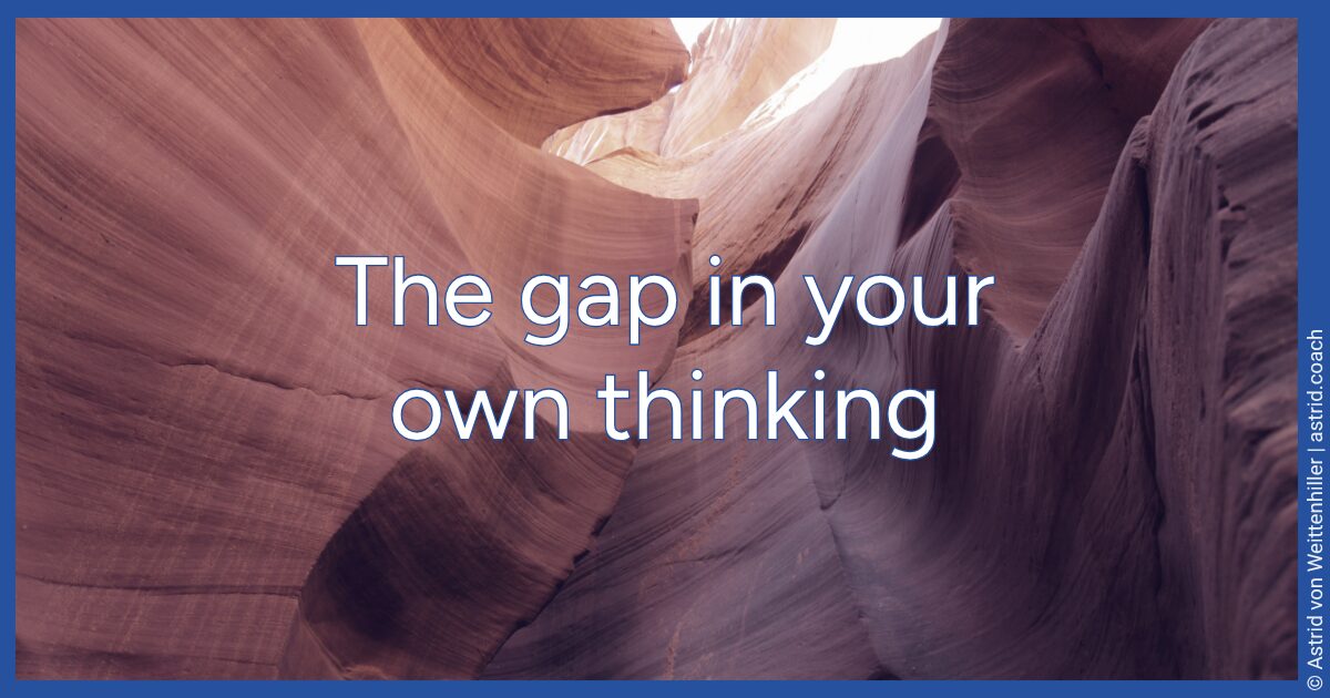 Narrow slot canyon with curved reddish-purple sandstone walls, overlaid with the title: The gap in your own thinking